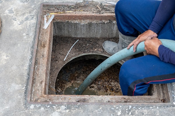 before grease trap pumping, it is recommended to clear the area around the trap and limit the use of kitchen drains